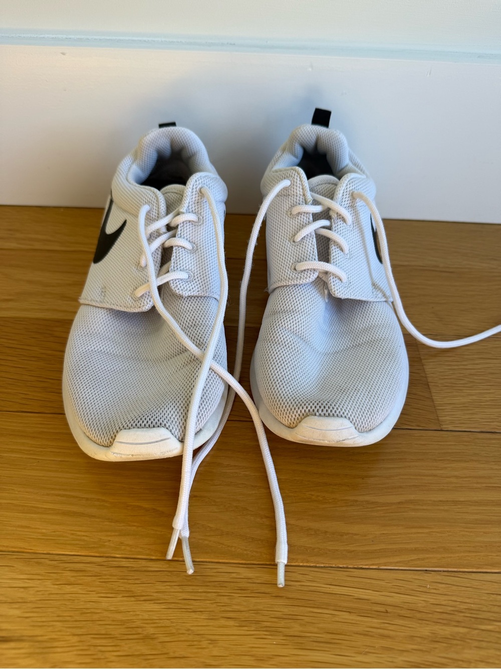 Nike White Mesh Running Sneakers with Black Swoosh